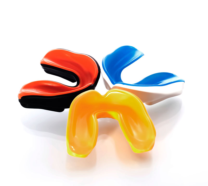 Three sports mouth guards